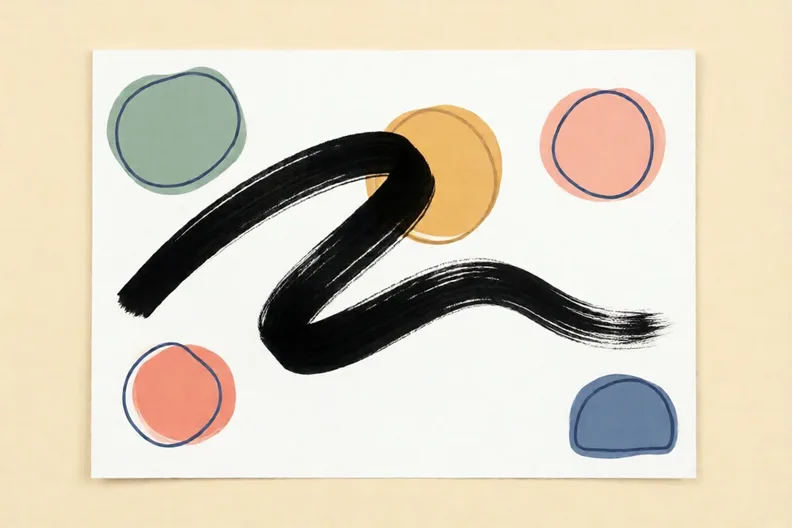 A single bold black ink swoop across a sheet of white paper
