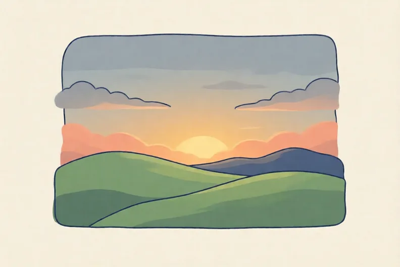 A soft grey sky low over a quiet hill at dawn