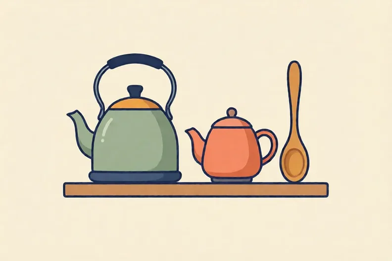 A kitchen shelf holding a kettle, a teapot and a wooden spoon