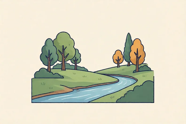 A grassy hill above a river with a few trees, no people