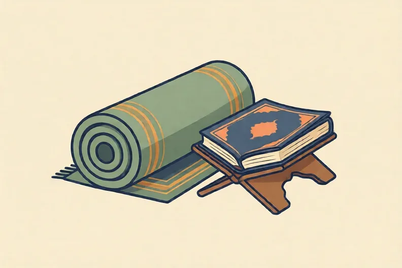 A rolled prayer mat beside a Qur'an on a wooden stand