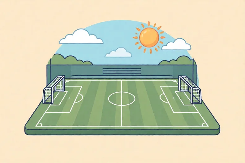 An empty football pitch with two goals at either end