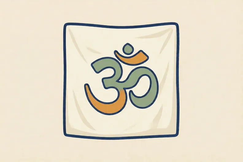 A plain cloth with a large sacred symbol drawn in the centre