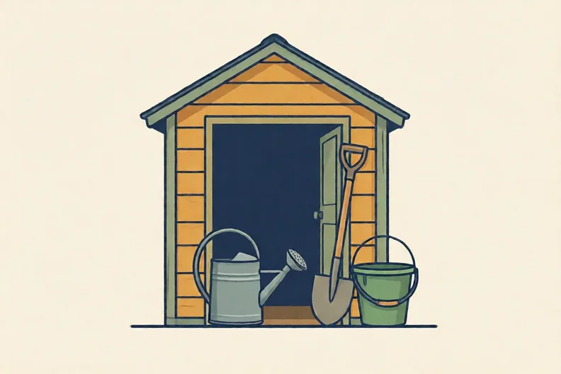 A garden shed with a metal watering can, a wooden spade and a green plastic bucket